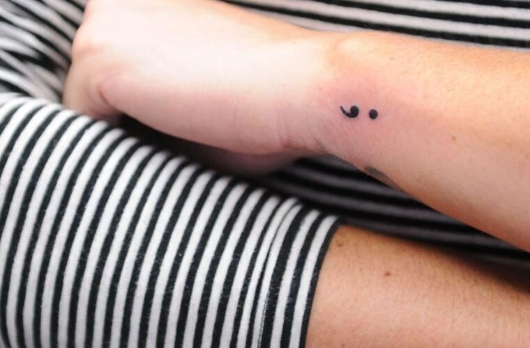 Why People Choose the Semicolon Tattoo as a Symbol of Hope